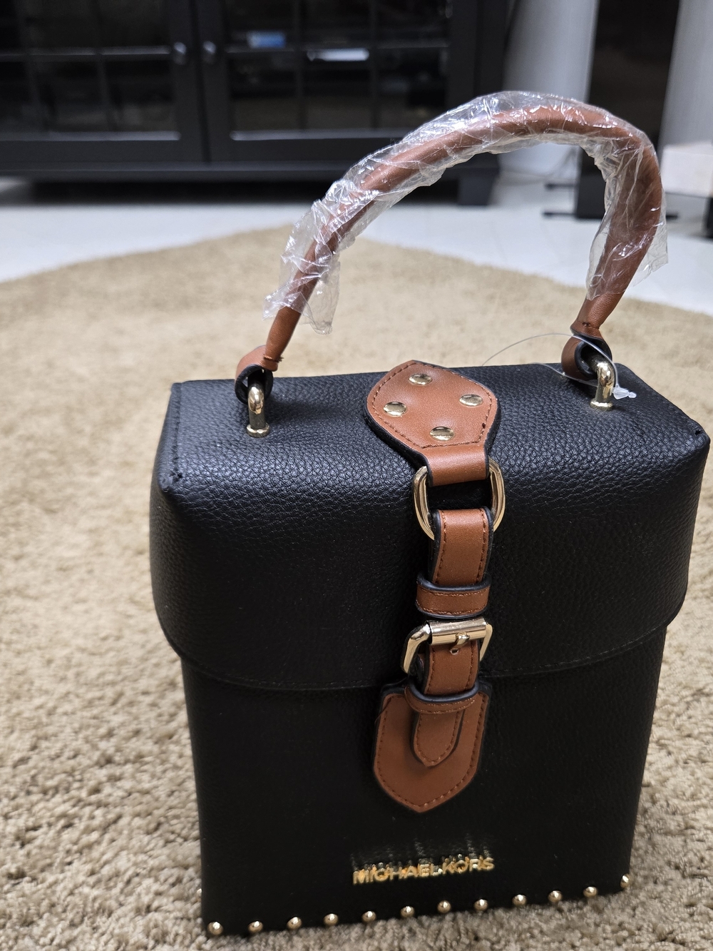 MICHAEL KORS Black Mini Top-Handle Bag with Brown Trim and Gold Hardware